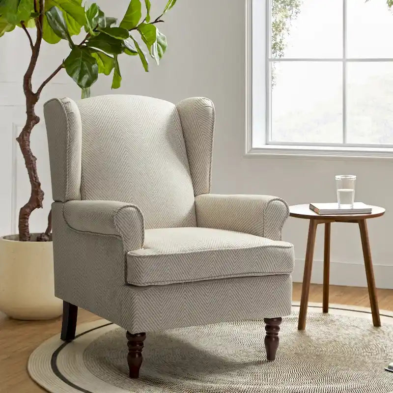 Fauteuil à oreilles traditionnel en tissu avec pieds tournés
