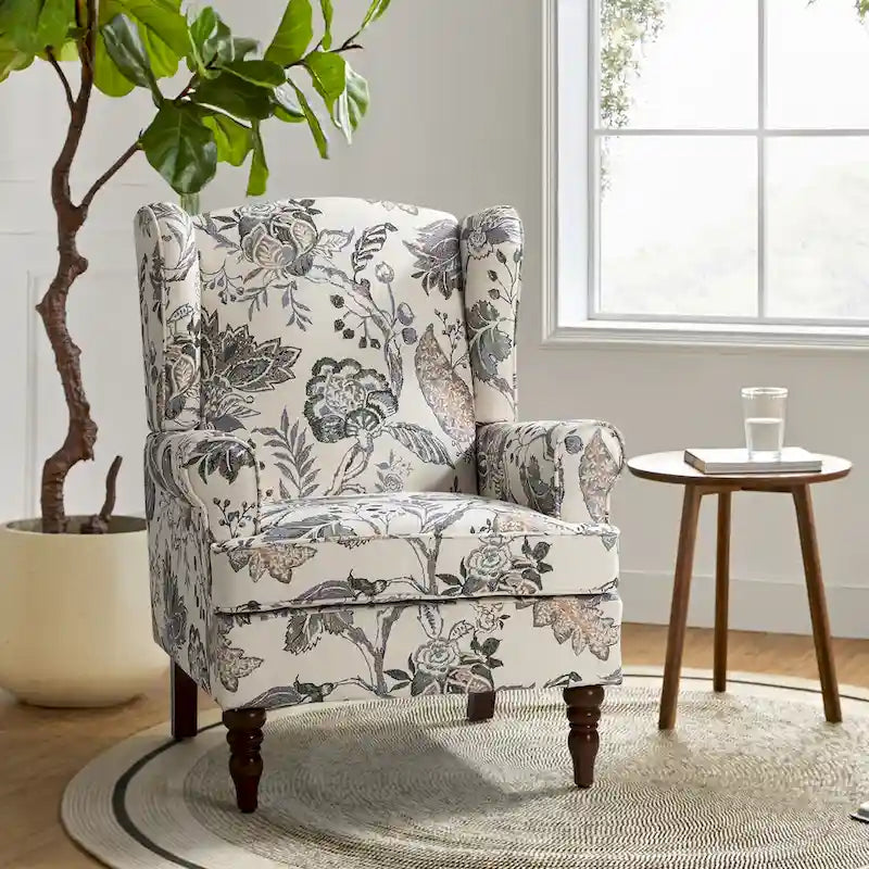 Fauteuil à oreilles traditionnel en tissu avec pieds tournés