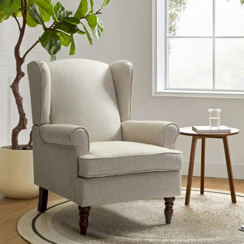 Fauteuil à oreilles traditionnel en tissu avec pieds tournés