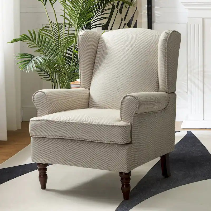Fauteuil à oreilles traditionnel en tissu avec pieds tournés